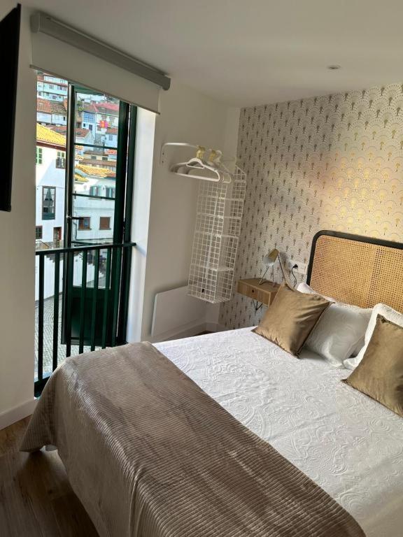 Apartamentos Urbanin II Plaza De San Pedro Кудільєро Екстер'єр фото